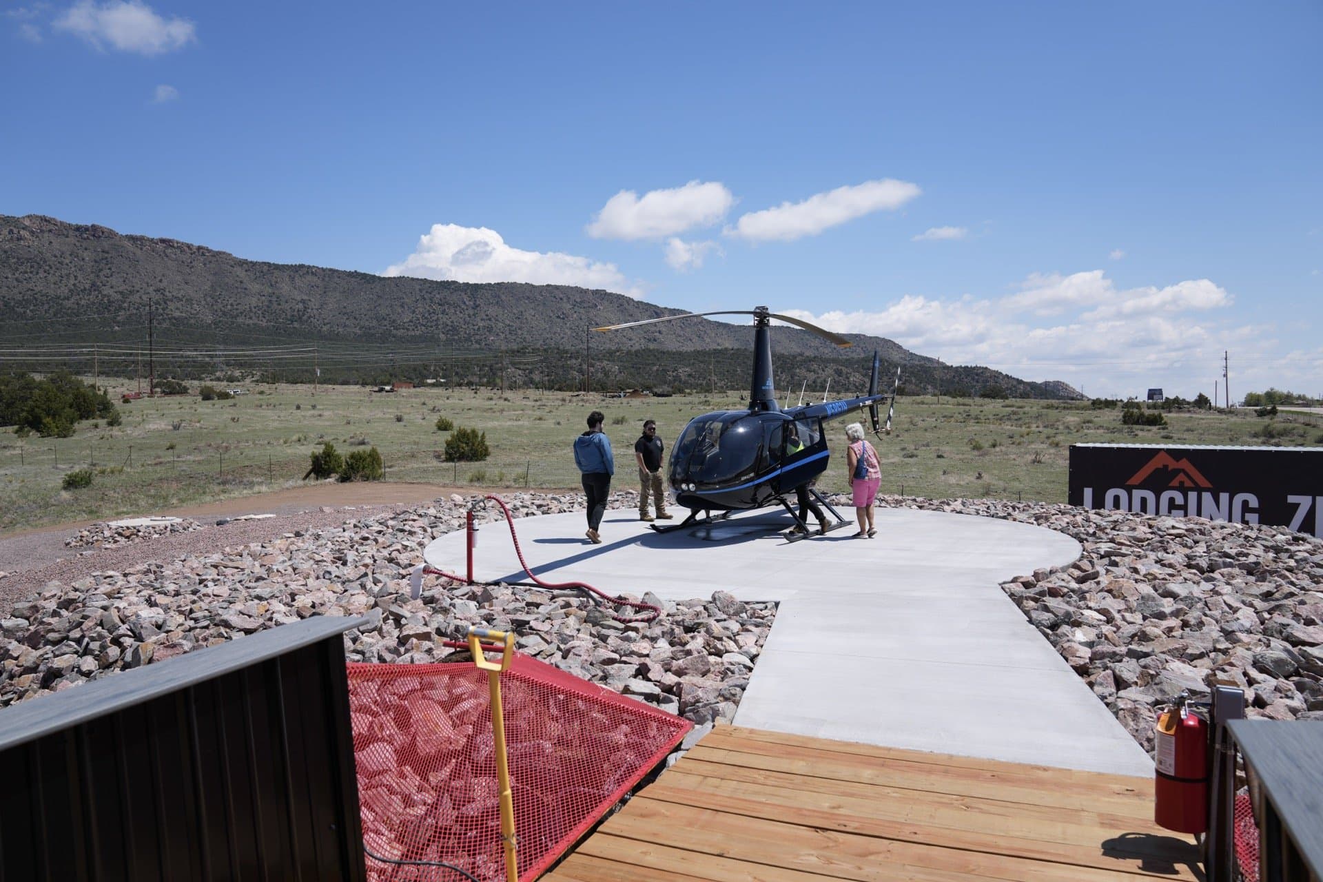 Guests being greeted at the helicopter tour departure pad